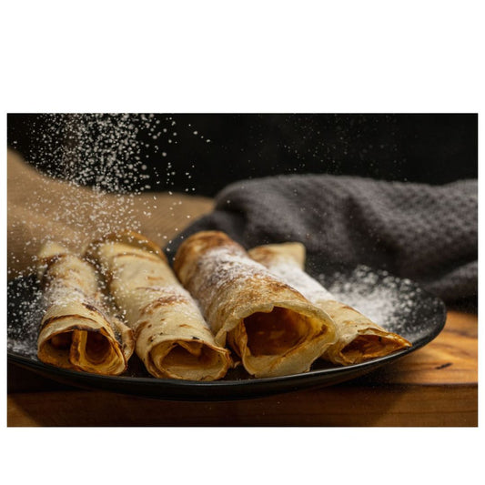 Panqueques caseros rellenos con manjar